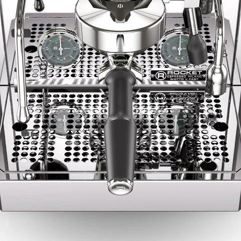 Giotto Fast V Espresso Machine Vibratory Pump controls and gauges on sleek chrome surface for precise brewing.