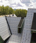 Top Shelf Synthetic Roof Underlayment Roll Covers 10 Squares installed on steep roof for durable waterproof barrier.