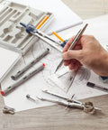 Using Pro Grade Geometry Set 15 Piece Drafting Kit With Protractor, Compass, Metal Ruler on architectural plans