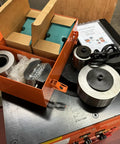 Heavy Duty Electric Rebar Bender For #10 1.25 Inch Grade 60 Steel And Round Bars portable tool components in orange box.