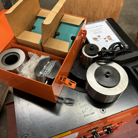 Heavy Duty Electric Rebar Bender For #10 1.25 Inch Grade 60 Steel And Round Bars portable tool components in orange box.