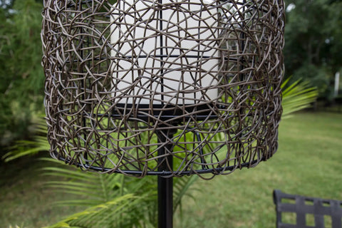 Close-up of Tanglewood Outdoor Floor Lamp in Oil Rubbed Bronze showing frosted bulb shield and decorative metal mesh design.