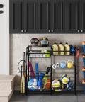 Small Garage Organizer For Sports Gear And Toys Space Saving Ball And Equipment Storage Rack Indoor Outdoor Garage Storage System Easy Assembly Black Finish with balls, rackets, and helmets displayed.