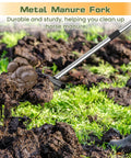 Heavy Duty Metal Manure Fork With Two Replaceable Durafork Heads And Steel Handle Rustproof Hay Pitch Fork in use on manure