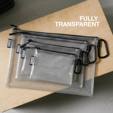 Clear Zipper Pouch Set Four Pack For Cables USB Adapters And Small Tech Gear Grab And Go Travel Organizers shown on table