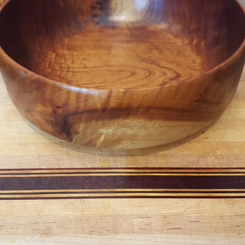 Wooden bowl on cutting board treated with Heavy-Duty Go-To Butcher Block Conditioner And Cutting Board Oil, 12 oz, food-grade blend