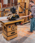 Rock Solid Shop Beast Five Horsepower Spindle Shaper With Massive Cast Iron Bed Digital Depth Gauge And Butter Smooth Fence Adjustments For Pro Level Woodcraft, heavy-duty spindle shaper in workshop.
