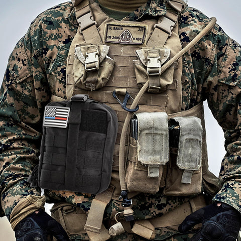 IFAK trauma kit in black MOLLE pouch with US flag patch on tactical vest