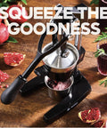 Extra Large Cast Iron Juicer Hand Press Citrus Squeezer for fresh orange pomegranate lemon juice, heavy-duty black cast iron, on table
