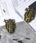 Two Pack Antique Bronze Duckbilled Hasp Clasp Latch Hardware Bronze Toggle Hasp Latches With Screws on a table