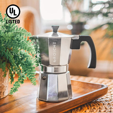 Stovetop Espresso Moka Pot For Home And Camping 6 Cup Italian Style Coffee Maker on tray surrounded by plants