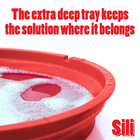 Close-up of red collapsible silicone saw blade cleaning tray filled with solution. Collapsible Silicone Saw Blade Cleaning Tray For Holding Cleaning Solution Ideal For Table Saw Circular Saw Miter Saw And Contractor Blades Up To 12 Inches In Diameter Great For Woodworking Maintenance And Quick Cleanup.