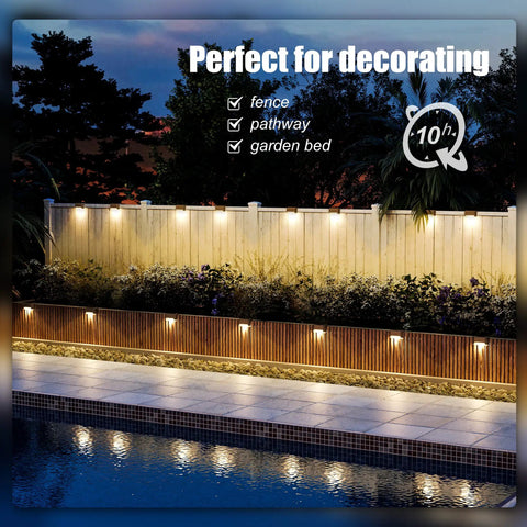 Top Shelf Solar Deck Lights 16 Pack, Slick Brown Shell Step Lights With Bright Warm White Glow, Weatherproof Outdoor Pathway Runners For Decks, Patios, And Backyard Zones illuminating a backyard fence and pathway.