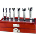 Heavy Duty High Carbon Steel Forstner Bit Set Seven Piece Woodworking Kit in wooden case, sizes 1/4 to 1 inch, designed for clean cuts.