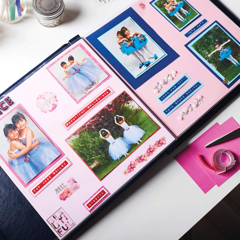 Scrapbook pages with photos, decorative labels from Embossing Label Maker Kit With 3 Tapes Ergonomic Handheld Labeler.