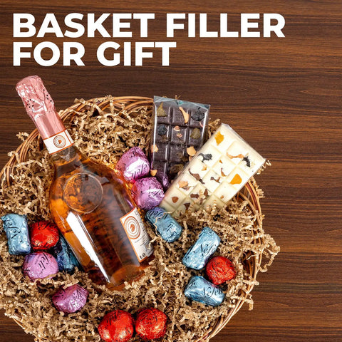 Basket with wine, chocolates, and 2.2 Lb Brown Crinkle Shredded Paper For Gift Baskets And Gift Boxes as filler