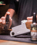 Person applying All In One Gun Cleaning Oil CLP For Firearms Clean Lubricate And Protect In One Step Removes Fouling Carbon Lead And Oil