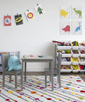 Kids playroom with 12 Bin Toy Storage Organizer in grey and white, 4-tier design, wood frame, steel dowels, art supplies neatly stored