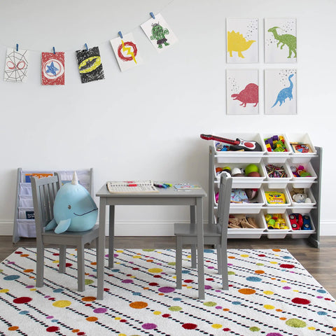 Kids playroom with 12 Bin Toy Storage Organizer in grey and white, 4-tier design, wood frame, steel dowels, art supplies neatly stored