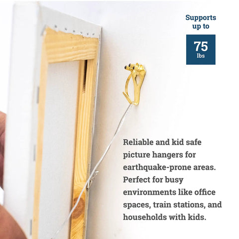 Heavy Duty Picture Hangers For Drywall And Plaster Walls, 75 Lb Earthquake Proof Hooks, gold hook holding picture wire on wall