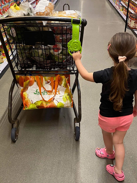 Child holding Detachable Toddler Stroller Handle For Child Safety Keeps Kids Close And Ready For Travel Must Have Accessory For Strollers Wagons Backpacks Shopping Carts And More Ideal Disney Trip Essential attached to shopping cart