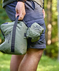 Person holding All Weather Front And Rear Shooting Bag Combo For Target Practice And Bench Rest Use Durable Olive Drab Bags
