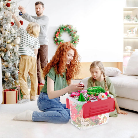 Family organizing holiday decorations from a Six Pack Heavy Duty Red Storage Bins With Secure Hinged Lids.
