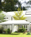 Heavy Duty 10 By 19.2 Ft Pop Up Canopy Tent For Parties And Events installed outdoors near white house