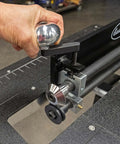 Bead Roller Knob Kit For Eastwood 19 Inch Bead Roller in use, showing ergonomic billet aluminum knob and redesigned bearing block for metal fabrication.