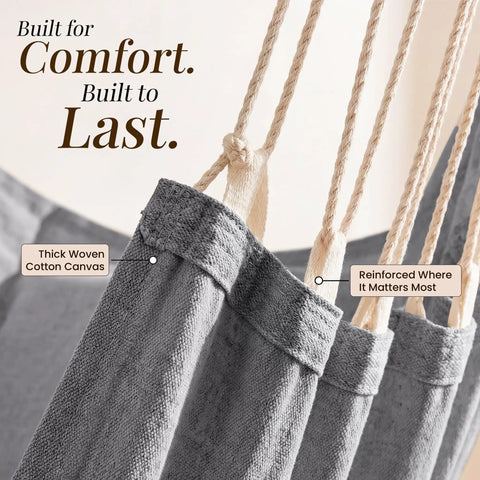 Close-up of the cozy full body hammock chair's thick woven cotton canvas and durable rope, labeled for strength and comfort.