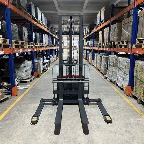 Mechmaxx 3300 Lb Electric Lithium Ion Straddle Stacker With 98 Inch Lift Height And Adjustable Legs Forks 24V Battery Industrial Pallet Handler For Warehouses in warehouse aisle
