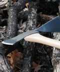 Pulaski Style Wildfire Axe With 3.75 Lb Forged Steel Head and 36 Inch Hickory Handle on charred wood