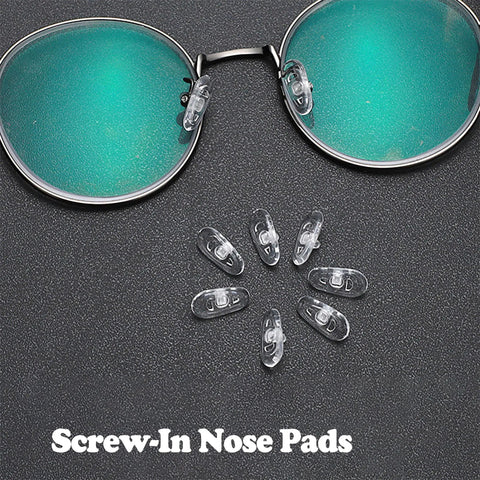 No Sweat Silicone Eyeglasses Nose Pads With Twenty Anti Slip Replacement Pairs plus screwdriver and glasses on a table.