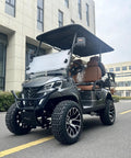 White 4 Seater Electric Golf Cart Featuring Flip Up Seats 48 Volt 150 Amp Hour Lithium Battery And Backup Camera parked outside a building.