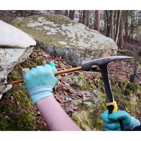 Deluxe Rockhound And Rock Mining Kit For Pros And Hobbyists 15 Piece Set hammer chiseling rock outdoors with gloves