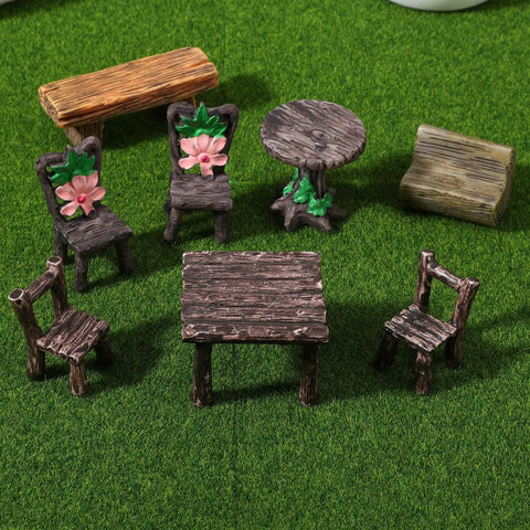 8 Piece Miniature Garden Figurines Resin Table And Chairs Set For Dollhouse Landscape Ornaments Vintage Village Vibe Decor For Gardens Moss Landscapes And Diy Craft Gifts displayed on green surface