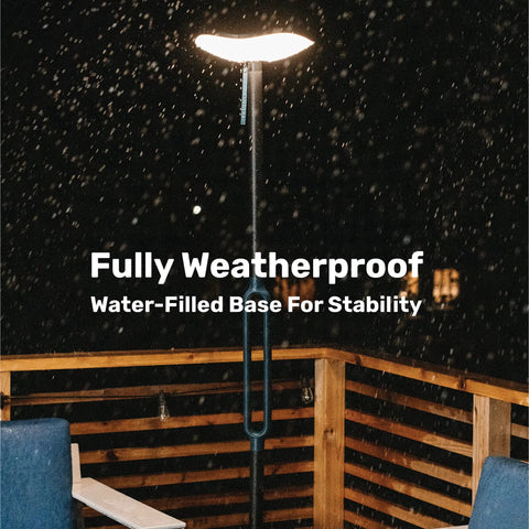 Cordless Outdoor Solar Floor Lamp With Bluetooth Speaker No Wires Needed For Patios And Decks Weatherproof on wooden deck