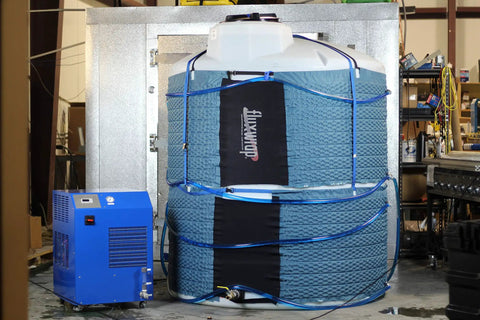 NSC1000-230-1 Freeze 1-Ton Industrial Chiller with blue wrap and tank setup for lasers, engravers, and welding equipment indoors.