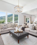 Contemporary living room with Six-Light Gold Chandelier With Rotating Arms, Modern Brushed Gold Finish, beige sofas.