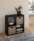 Open Back 4 Cube Storage Organizer In Black Built With A Sturdy Frame And Finished On Front And Back Perfect For Living Room Or Closet Organization Accepts 13 Inch Fabric Bins Easy Assembly displaying two bins and decor items