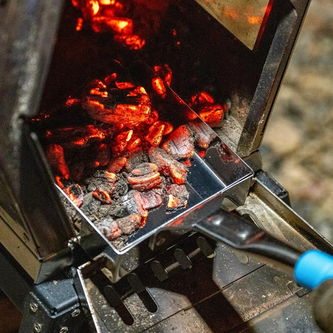 Heavy Duty Wood Stove Ash Shovel With 14.6 Inch Rust Resistant Blade, Blue Handle, scooping ashes from a wood stove