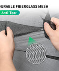 Hands stretching durable fiberglass mesh of Garage Door Screen For 2 Car Garage With Magnetic Closure And Heavy Duty Weighted Bottom.