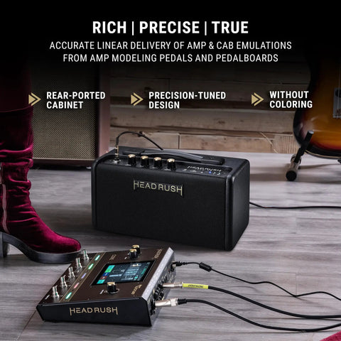 FRFR-GO Portable 30W Guitar Amp For Electric And Bass with Dual 3 Inch Speakers on a studio floor