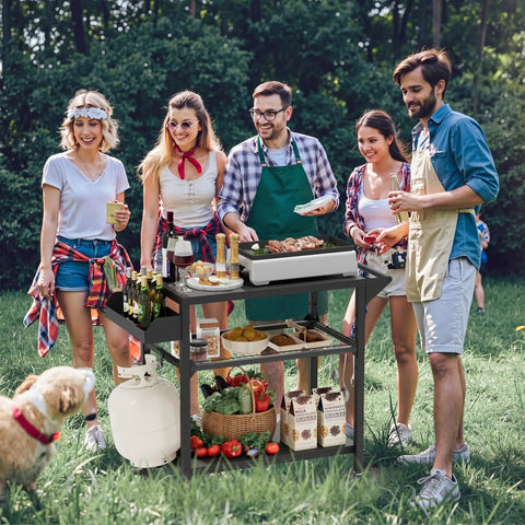 Group enjoying barbecue with All Weather Outdoor Grill Table On Wheels For Patio Garden And Camping Heavy Duty Movable BBQ Prep Cart Rust Proof Weather Resistant Kitchen Stand For Parties Barbecues And Pizza Oven Stand outdoors