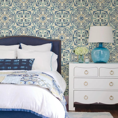 Florentine Tile Peel and Stick Wallpaper in Blue, Floral Pattern for Walls, bedroom decor with white bed and blue lamp