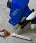 Air Sand Blaster Gun With Gravity Feed for Quick Paint and Rust Removal in action on a rusty wrench with replaceable steel nozzle