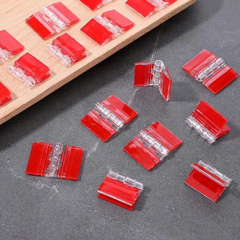 20 Pcs Self-Adhesive Clear Acrylic Hinges 35x25mm Mini Transparent Hinges for DIY Crafts on gray surface