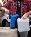 Heavy Duty Hand Operated Diesel Exhaust Fluid Transfer Pump For 55 Gallon Drums in use with a container