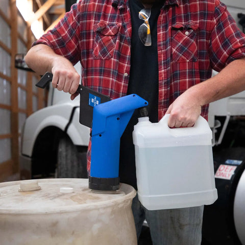 Heavy Duty Hand Operated Diesel Exhaust Fluid Transfer Pump For 55 Gallon Drums in use with a container