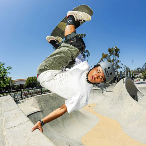 Skateboarder wearing Old School Low Pro Certified Helmet with Deep Fit and SlimTech Core for Skateboarding, BMX, Cycling, Roller Skating